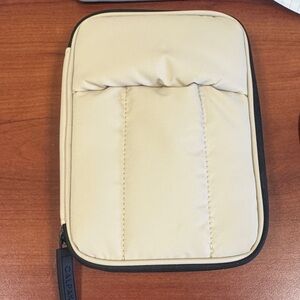 Calpak Cream and Black zip wallet/passport holder
